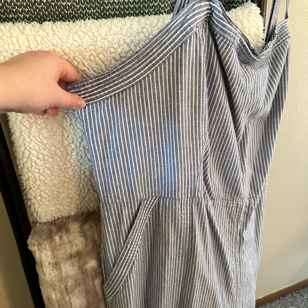 Women’s one piece jump suit.